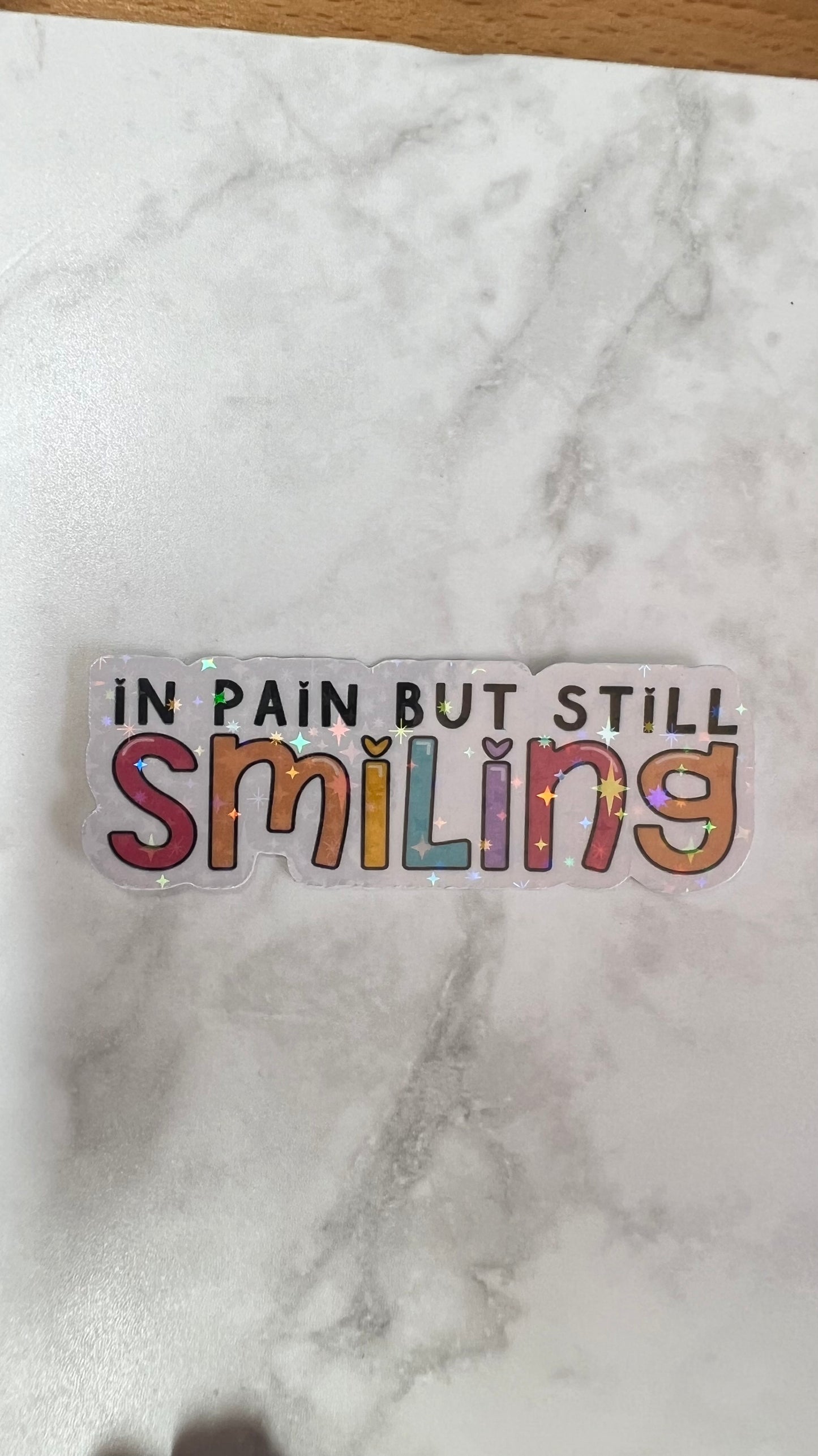 “In pain but still smiling” chronic pain holographic sticker