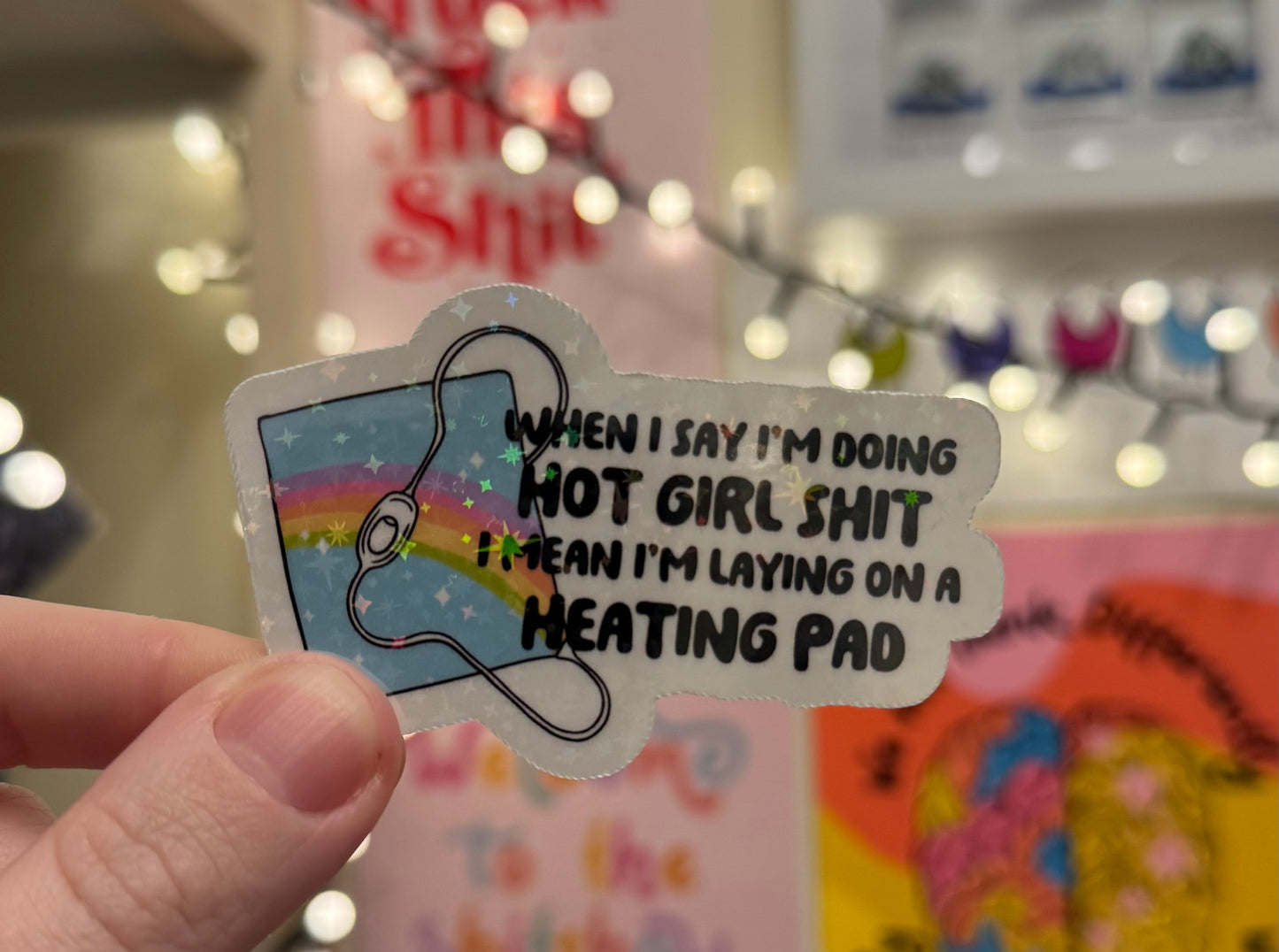 “When I say I’m doing hot girl shit, I mean I’m laying on a heating pad!”Holographic Sticker