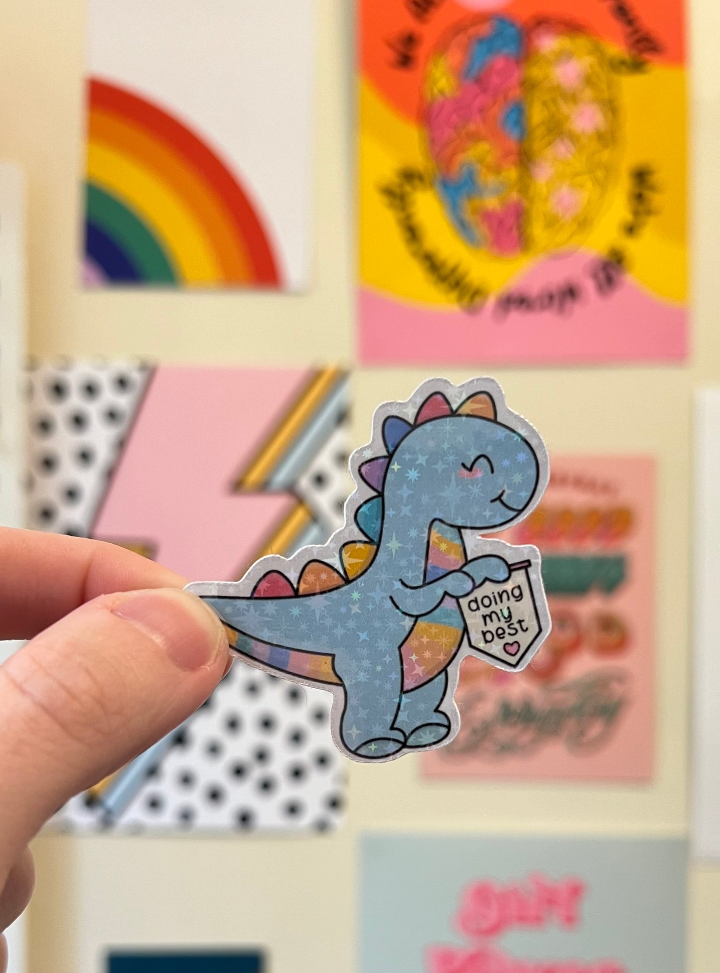 “Doing my best” rainbow dino holographic sticker