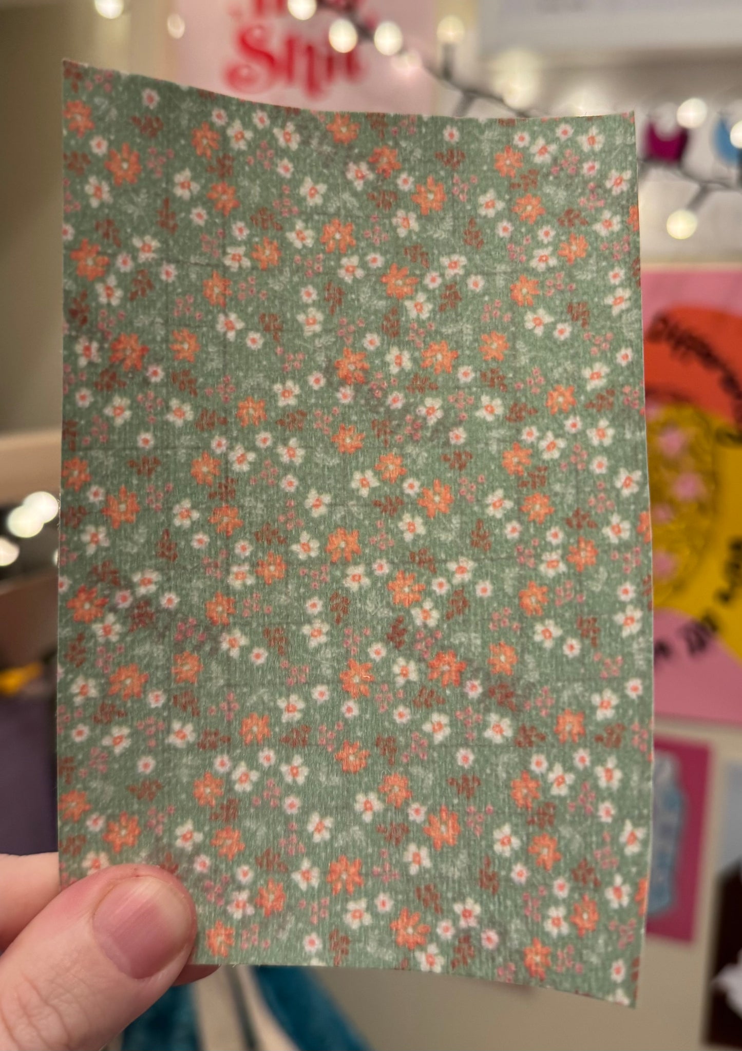 Dainty pink flowers on green Tubie tape