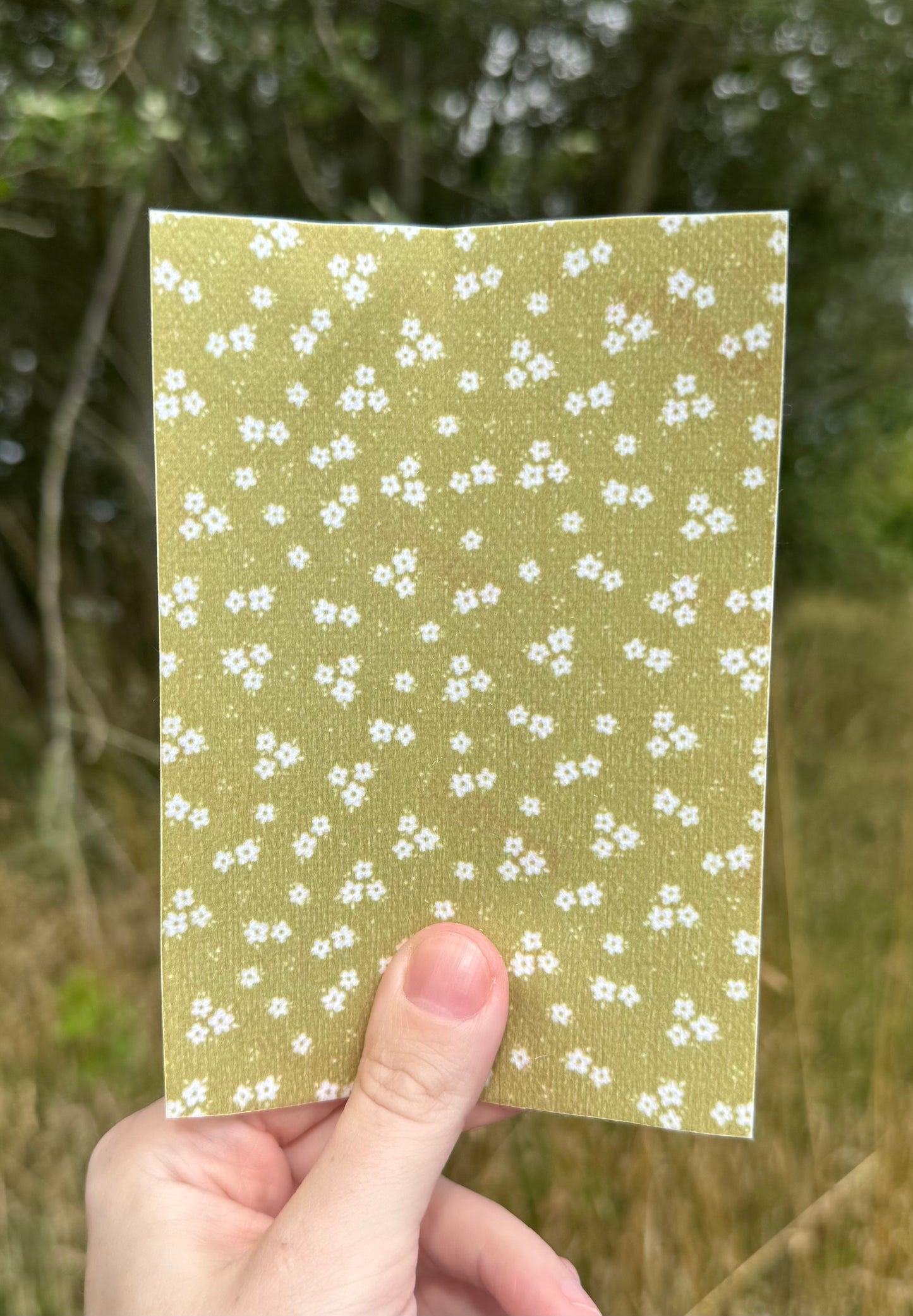 Little flowers on sage green tubie tape