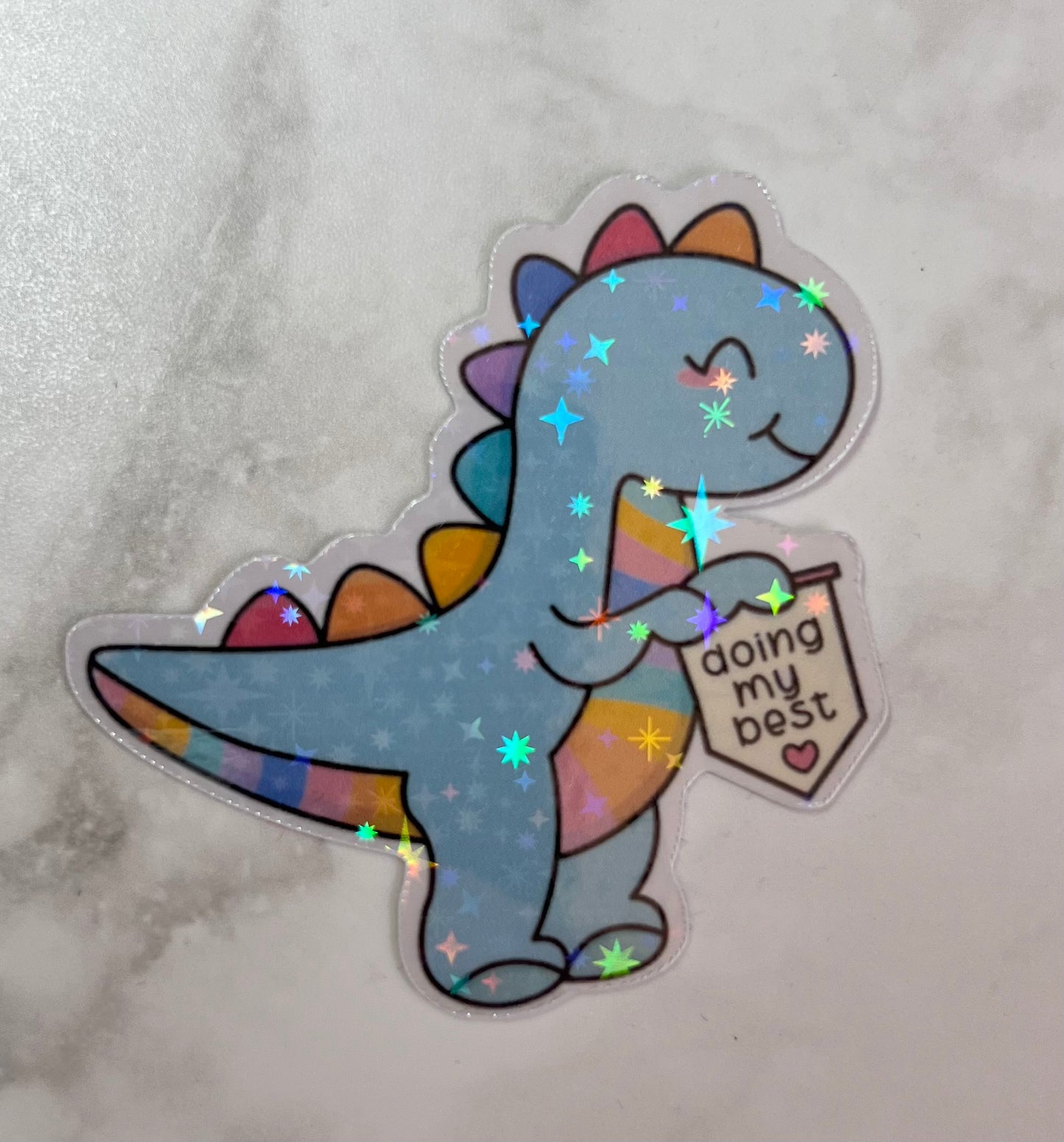 “Doing my best” rainbow dino holographic sticker