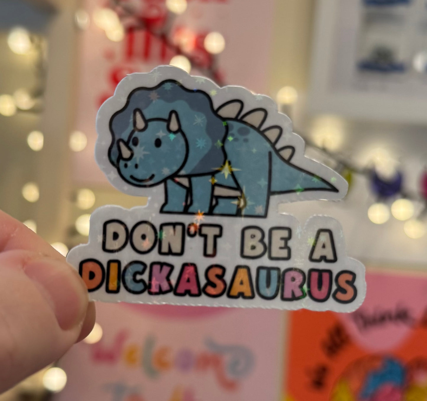 “Don’t be a dickasaurus” dino Holographic Sticker