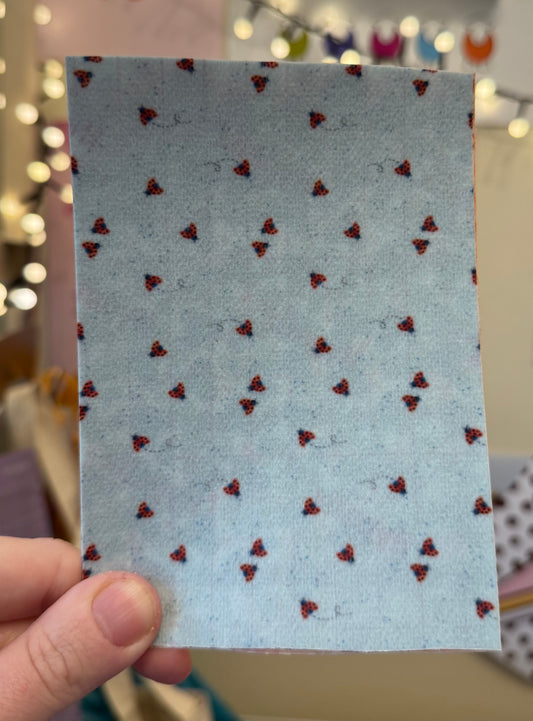 Tiny ladybugs on blue Tubie tape
