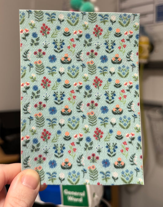Blue pastel flowers on blue Tubie tape