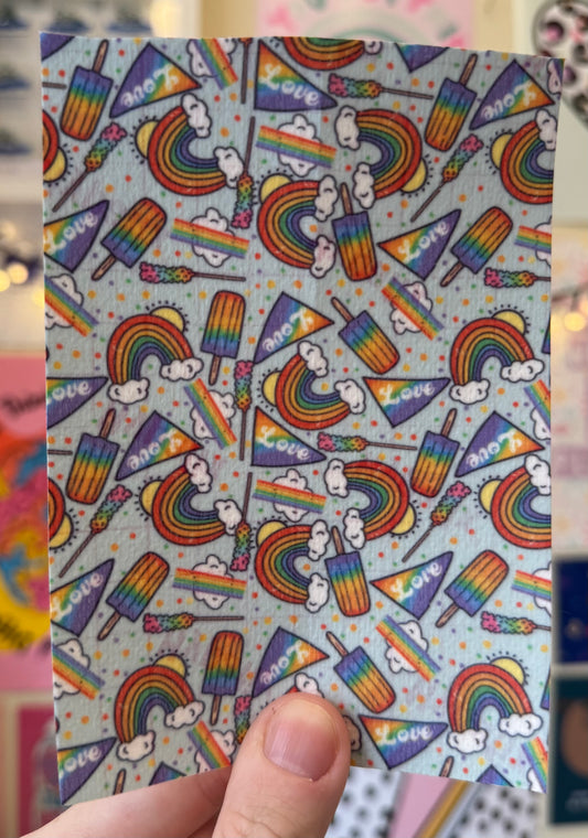 Rainbows, love flags and ice-lollys Love wins bags, pride flags on yellow LGBT pride 2025 Tubie tape