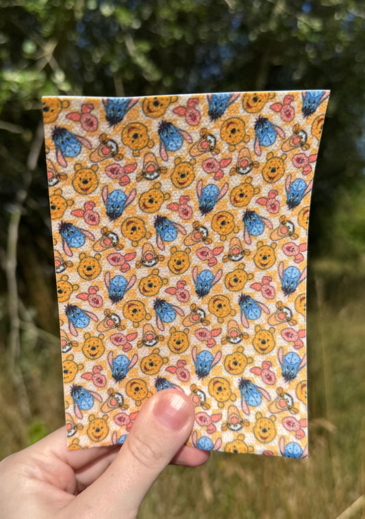 Yellow checkered Winnie the Pooh and friends