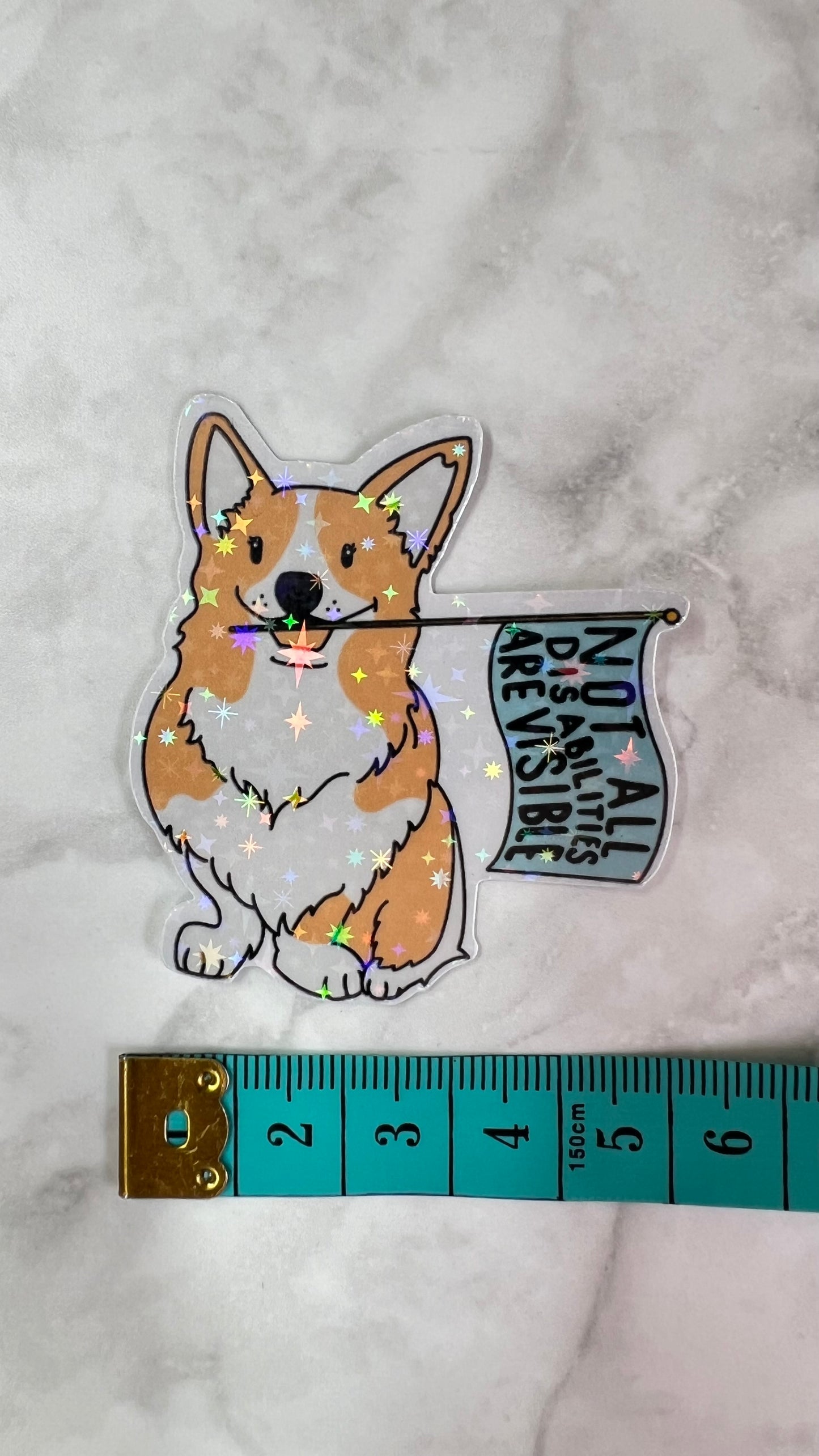 “Not all disabilities are visible” flag waving puppy holographic sticker