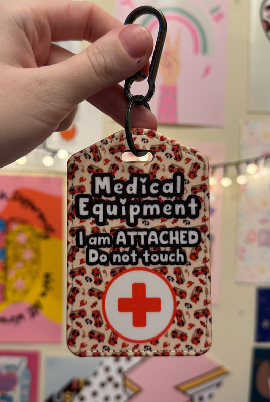 Medical bag tag “medical equipment, I am attached, do not touch” (fire engine print)